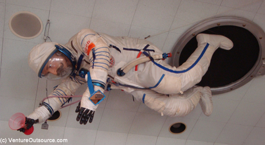 Russian Cosmonaut suit hangs from ceiling at Buck's in Woodside, CA.